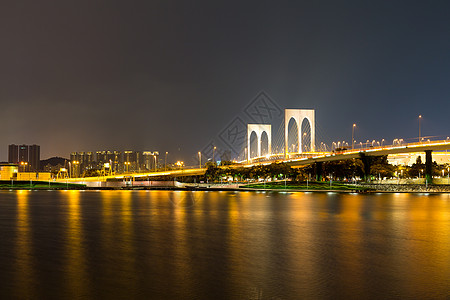 信阳南湾湖夜间澳门市建筑学假期地标商业货车城市建筑摩天大楼景观酒店背景