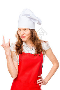 身着帽子和围裙的女孩在白色的后院上举手示意图片