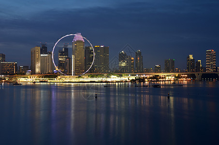 日落时新加坡城市风景办公楼摩天轮景观天空商业大楼车轮码头建筑办公室图片