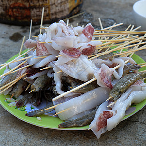 周末晚宴的切鱼烧烤食物章鱼家庭派对炙烤乌贼团体美食美味海鲜图片