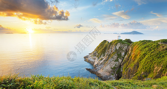 日出时香港灯塔天空太阳地标石头场景海岸蓝色支撑海洋安全图片