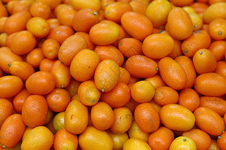 新鲜的橙子海藻柑橘仁水果零售食物市场展示销售近观季节收成味道团体背景图片
