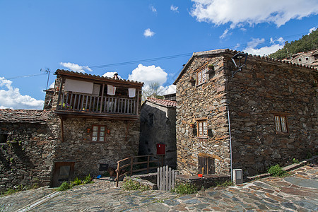 岩片漆葡萄牙典型的先歇式家庭手工房子石头村庄片岩游客白色岩石工艺乡村背景