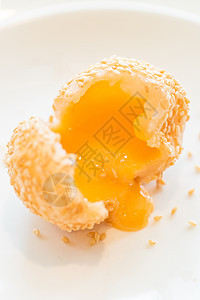 芝麻球和奶油岩浆种子饺子小吃文化蛋糕糕点面团甜点糖果金黄色图片