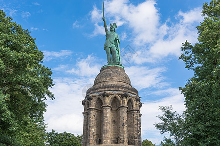 德国Teutoburg森林的Hermann纪念碑头盔地标战场国家建筑摄影建筑学建造业姿势天空图片