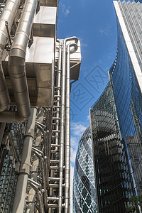 英国伦敦商业金融区城市玻璃日落办公室建筑摩天大楼建筑学地标景观码头图片