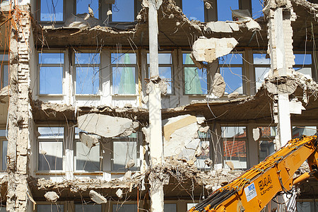 建筑物拆解墙壁挖掘机建造房屋工地拆除拆迁建筑电缆窗户图片