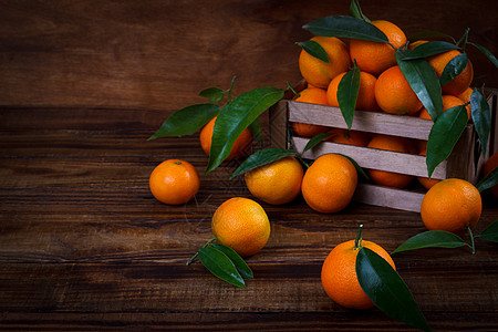 普通普通人或橘子贴近食物素食者桌子水果营养小吃甜点木头热带美食图片