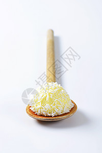 柔力球木勺上的椰子松露奶油食物椰丝香草勺子糖果棉花甜点饼干巧克力背景