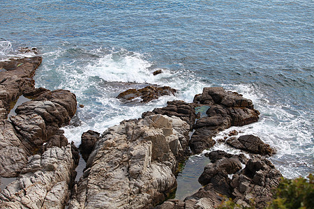 海边的岩石海浪石头海洋沙滩海岸线旅行花岗岩悬崖海岸支撑图片