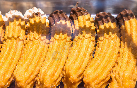 商店里新鲜的西班牙菜盘子木头营养饼干传统文化油炸面粉团体面团图片