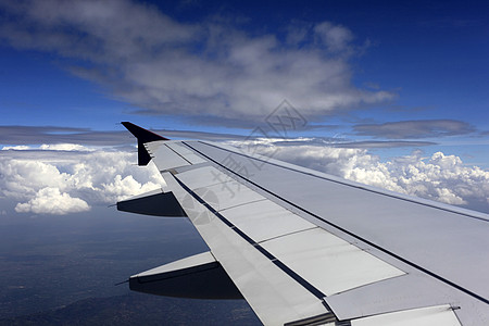 飞机机翼高度天空蓝天冰雹空气蓝色云景积雨天堂自由背景图片