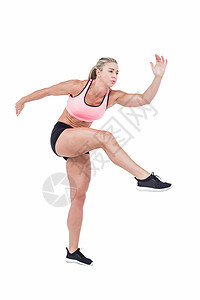 女运动员跳跃奉献训练赛车手女性跳远成就能力游戏精神行动图片