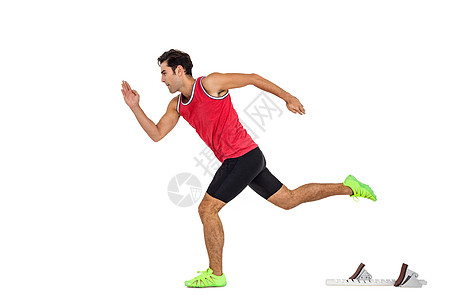 自信的男性运动员从起步街区跑来运动服活动男人竞赛起跑游戏活力竞技播放器运动鞋图片