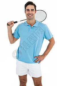 羽毛球玩家的肖像 用手站在臀部活动字符串活力运动爱好男性球拍微笑运动服专注图片