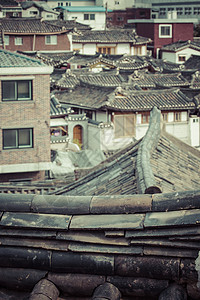 北村韩屋村村是韩国三角车的著名地点之一历史性女性旅行邻里房子建筑物村报游客村庄天际背景