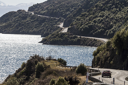 新西兰的这条道路空气灰色绿色沥青白色阴影假期木头蓝色天空图片