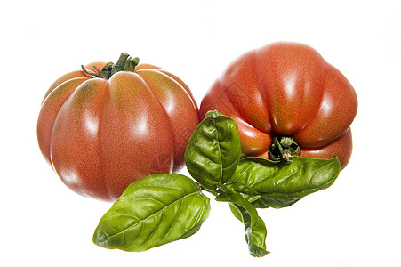 两个成熟的西红柿叶子圆形营养白色绿色红色食物蔬菜农业眼睛背景图片