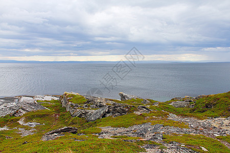 挪威北部地貌景观场景海滩海洋顶峰草地支撑反射地平线海岸线旅行图片