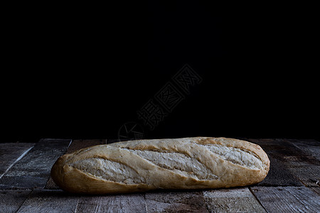 Baguette 带巴格特的黑色背景图片