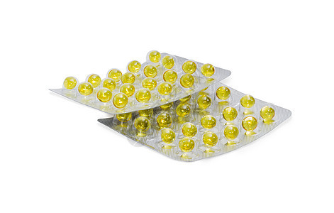 光背景黄色药丸的浸泡器包装疾病医药药店治愈胶囊吸塑药剂药物治疗药片药品背景图片