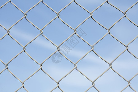 电线网栅栏铁丝网金属图片背景工厂蓝天围栏背景图片