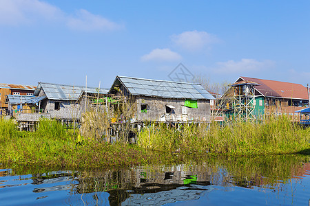 缅甸内尔湖村庄入口生态蓝色天空文化小屋建筑学院子国家图片
