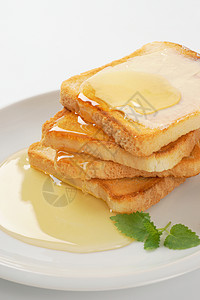 含黄油和蜂蜜的吐司面包面包团体食物早餐图片