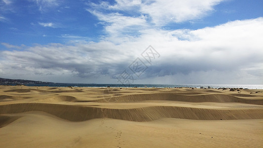 西班牙马斯帕洛马斯阳光日美丽的沙丘海滩蓝天质地沙地山脉蓝天白云全景自然景观景观图片