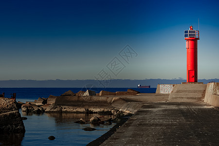 防断水堤坝红灯塔海洋海岸灯塔海浪码头海岸线海景蓝色石头建筑图片