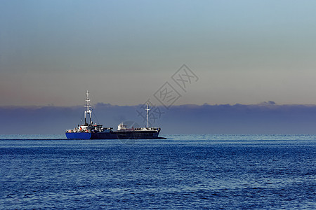 蓝货船海洋货运商业橙子船运物流进口蓝色货物出口图片