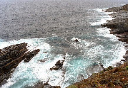 岩石和海洋石头旅行巨石海岸线旅游荒野海岸阳光天空海堤图片