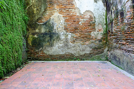 过时的旧砖墙背景水泥石工风化黑色棕色石头墙纸红色白色材料图片