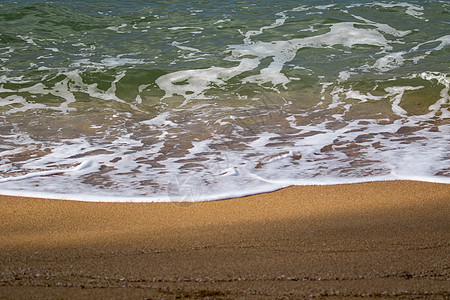 沙滩上柔软的海浪景象支撑冲浪海洋液体海景热带海岸波纹假期波浪图片