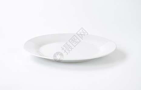 白色瓷板板盘子陶瓷制品餐具圆形陶器背景图片
