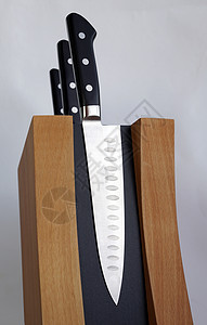一套厨房用刀切菜板木板光泽度技术刀刃边缘工具金属碳质礼物图片