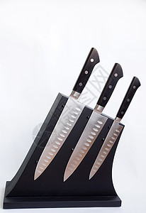 一套厨房用刀切菜板边缘金属碳质技术工具刀刃木板礼物光泽度图片