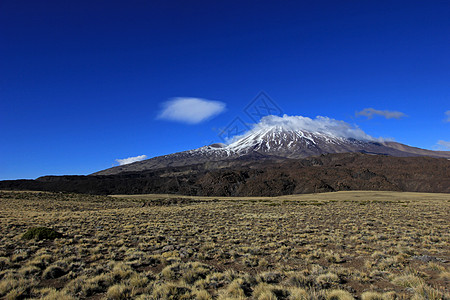 阿根廷 雪化火山特罗门旅游阴天环境悬崖冒险顶峰云天蓝色雪山阳光图片