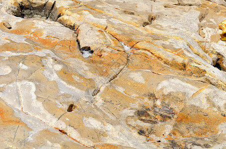 特写石头背景的纹理石质石灰石岩石巨石砂岩灰色材料宏观矿物花岗岩图片