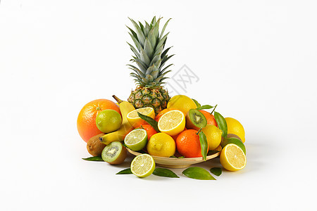 热带水果类种情调异国团体叶子香蕉黄色盘子绿色柠檬橙子图片