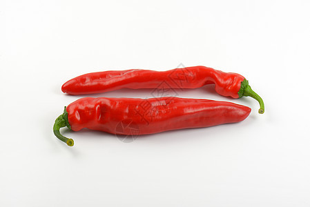 两个红胡椒辣椒蔬菜红色食物背景图片