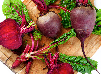 新鲜青菜砧板餐巾健康饮食生食素食饮食农场乡村紫色叶子图片