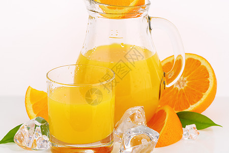 新鲜橙汁橙子立方体果汁黄色液体绿色水果食物玻璃叶子图片
