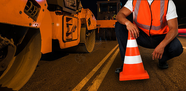 修复道路碎石街道材料修理男人信号工程锥体职业交通图片