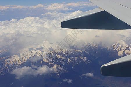 平翼和山丘高山土地地形风景自由冰川飞机窗户首脑高度图片