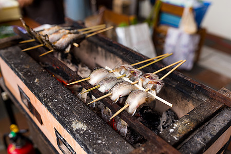 咸烤鱼食物美食小贩炙烤厨师旅行摊位盘子自助餐市场背景