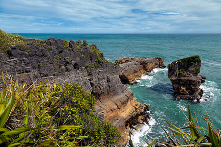 Punakaiki附近的煎饼摇滚支撑风景沿海悬崖侵蚀气孔旅游蓝色地平线海岸图片