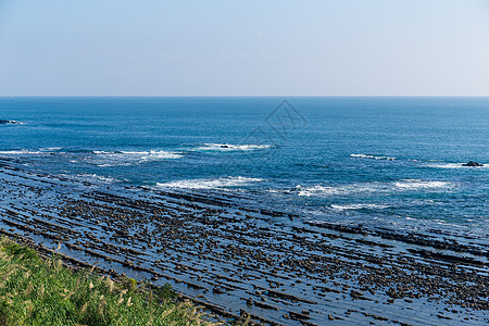 青岛岛海岸海浪石头冲浪天空海景晴天阳光公园海洋蓝色图片