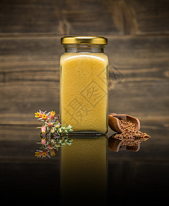 罐子里的蜂蜜静物产品颗粒蜜蜂蜂房养蜂业药品反射玻璃花粉图片
