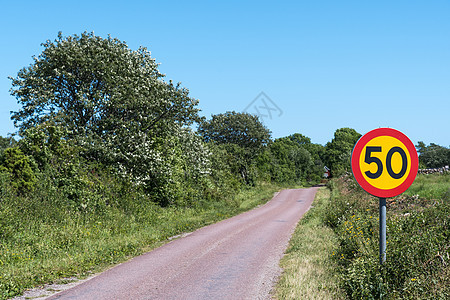 限速交通标志驾驶旅行数字法律邮政速度车辆路标树木警告图片